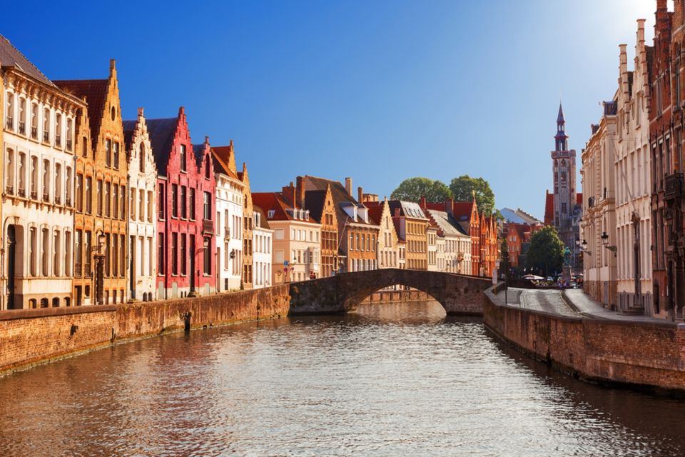 From Amsterdam: Day Trip to Bruges in Spanish or English - Optional Audio Guide