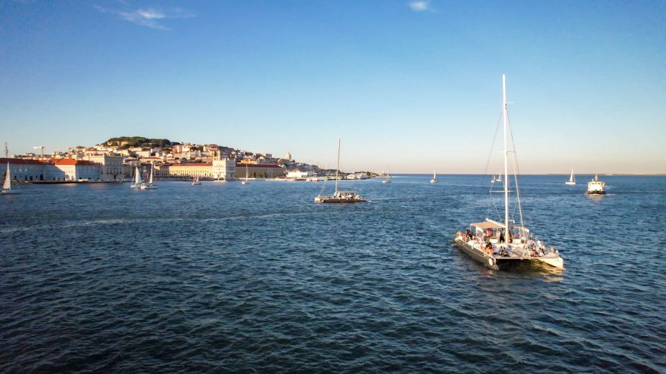 Lisbon: Sunset Catamaran Tour With Music and Drink - Languages and Accessibility