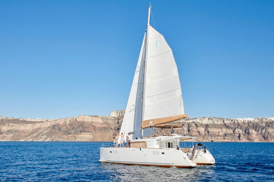 Santorini Gold Catamaran Cruise With Snorkel, BBQ & Open Bar - Why Choose This Cruise