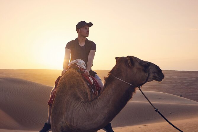 Morning Desert Safari With Camel Ride and Sandboarding - Key Points