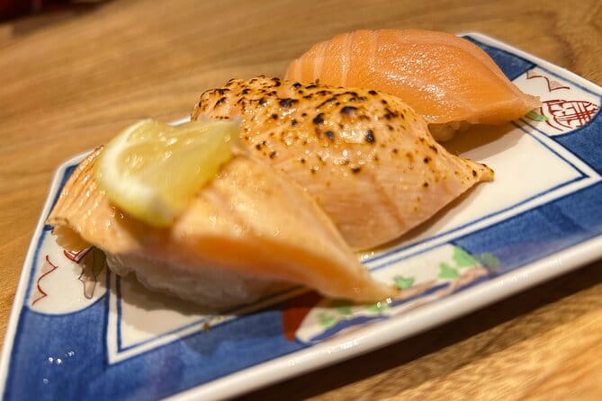 Tokyo : Asakusa Food Tour & Local Bar-Hopping - Signature Dishes: Gyoza and Okonomiyaki