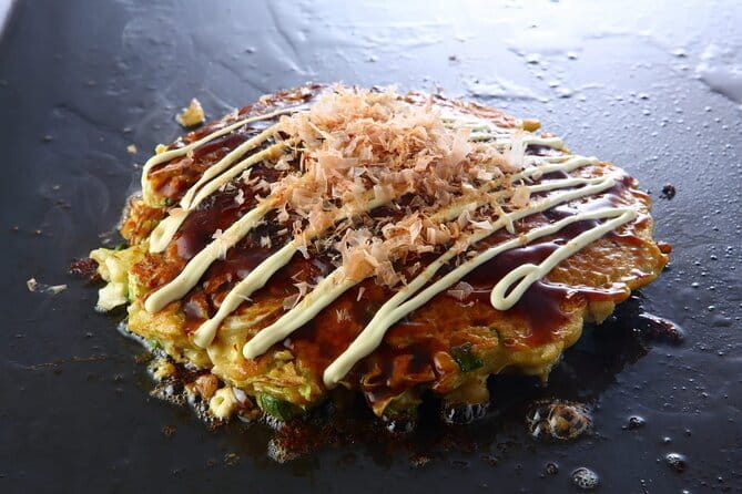 Osaka Cooking Class and Sake Tasting With Local Supermarket Visit - Sake Tasting: A Journey Through Japanese Brews