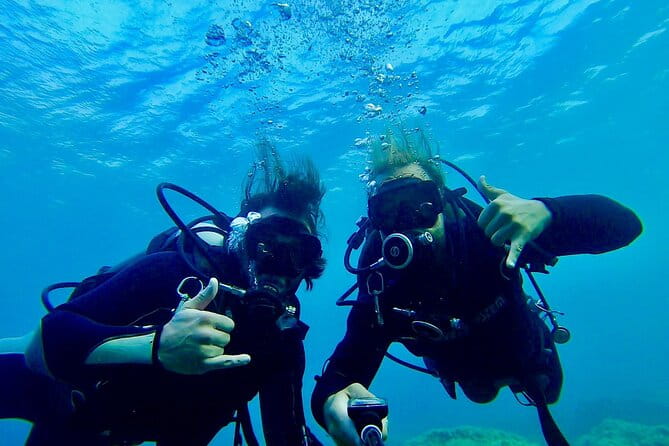 "Baptism of the Sea: Diving on the Island of Elba" - A Closer Look at the Elba Scuba Baptism