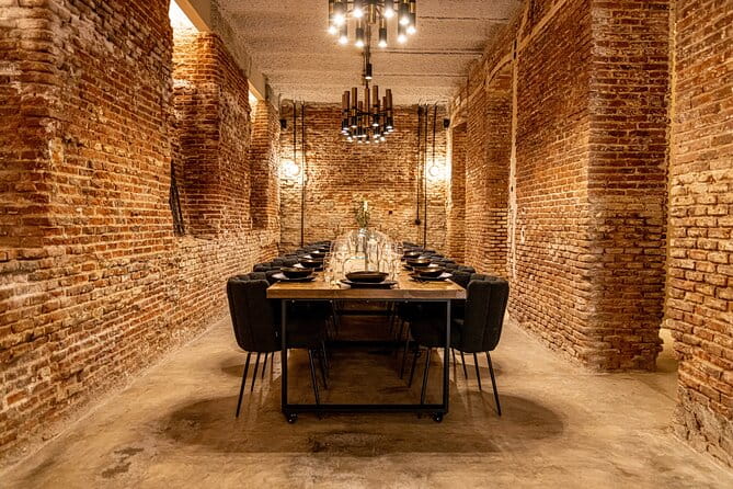 Madrid Local Tapas Tour with Private Dinner and Bottomless Wine - Tasting Iberian Delights in a Renovated Museo del Jamón