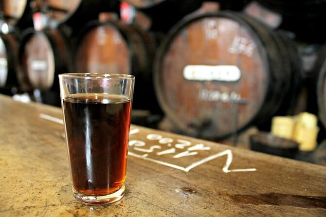 Malaga Gastronomy Tour Wines and Spanish Tapas - The Vibrant Plaza del Siglo: Fish and Cooking Shows