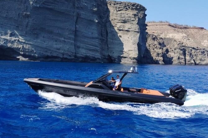 Santorini Caldera: Private Cruise with Speed Boat & Open Bar - Discovering the Volcano: Nea Kameni and Hot Springs