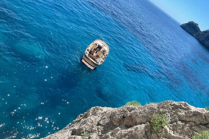 Three Hour Private Guided Tour of Capri with a luxury Gozzo cabin cruiser - The Sum Up