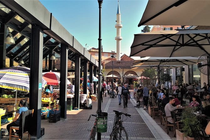 Tirana Walking Tour, Extra Virgin Olive Oil and Raki Tasting - The Trendy Blloku: From Restricted Zone to Hotspot