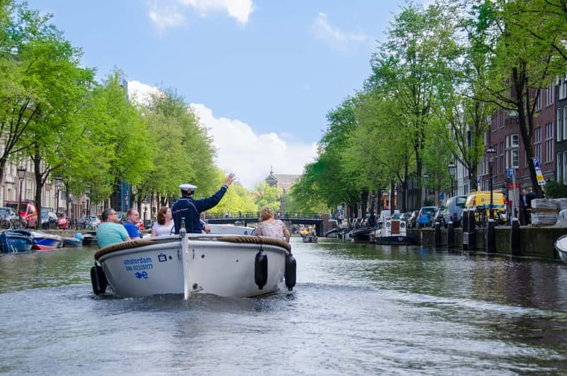 Amsterdam: 75 minute Open Boat Canal Cruise with Live Guide - The Itinerary and Its Highlights
