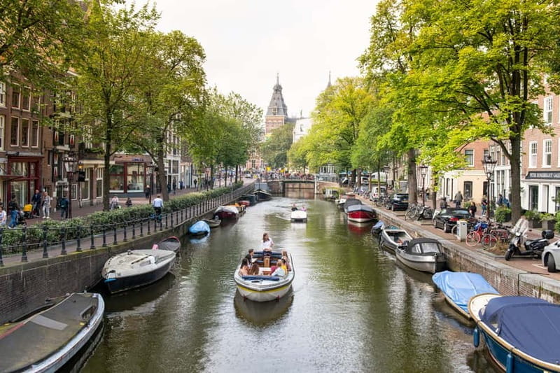 Amsterdam: Open Boat Tour of Canals with Expert Local Guide - Who This Tour Is Perfect For