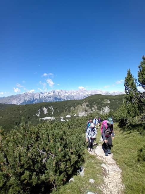 Andalo: Trekking Tour to Paganella's caves & Eagle's Throne - The Cave Exploration and Overhanging Walls