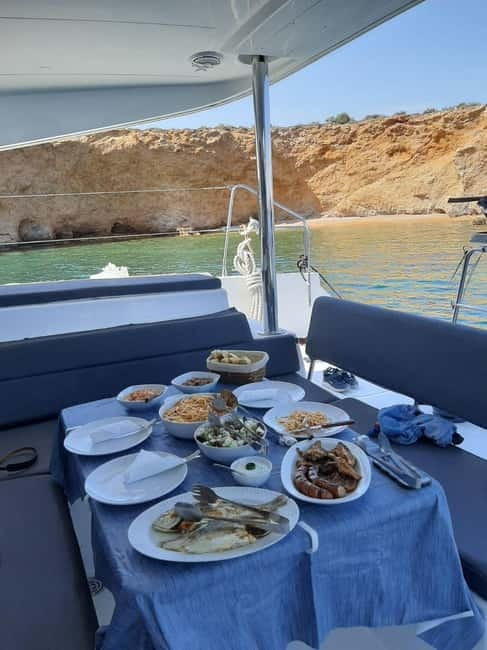 Athens: Private Catamaran Experience with Meal & Open Bar - The highlights of coastal sightseeing and snorkeling