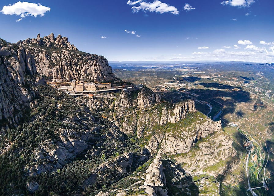 Barcelona: Montserrat Monastery Guided Tour with Transfers - Exploring the Monastery and Its Architectural Marvels