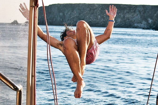 Boat Party with Swimming Stop Experience in Mykonos - Sunset Views and Coastline Lights