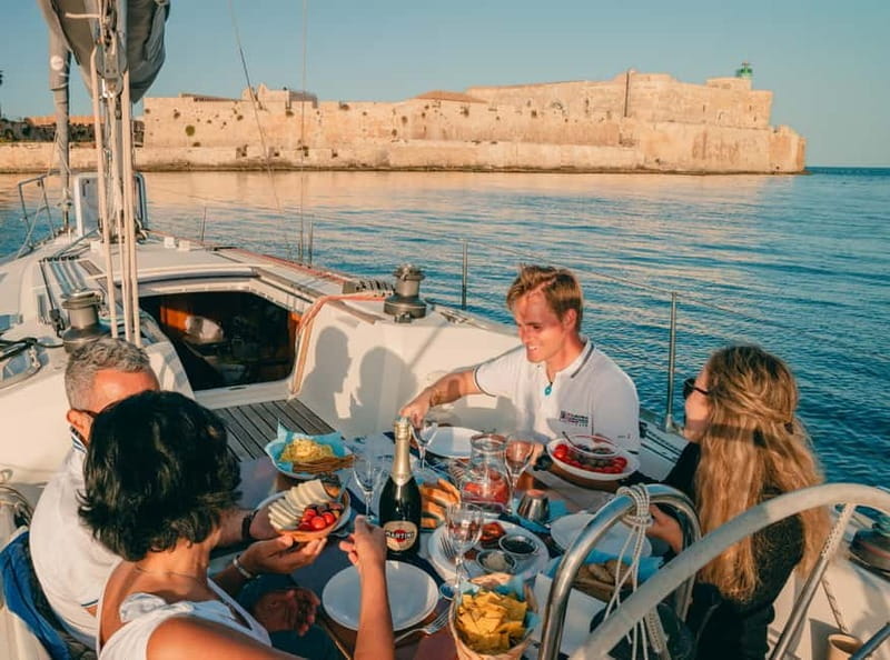 Catania: Sunset Sailing Aperitif - Swimming and Snorkeling in Azure Waters