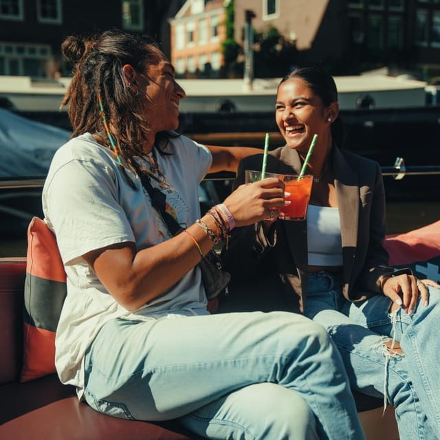COZY AND FUN CANAL TOUR: A UNIQUE JOURNEY THROUGH AMSTERDAM - The Electric Boat: Quiet and Green