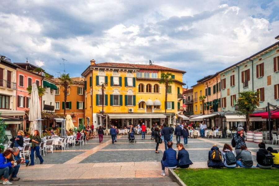 Festive Journey in Sirmione Christmas Walking Tour - Walking Through Piazza Castello