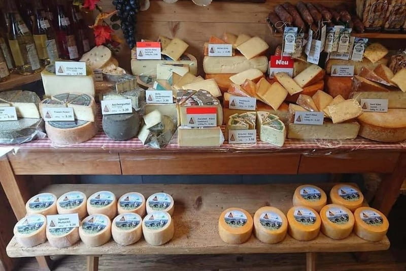 From Basel: Thun Tour, Cruise & St. Beatus Caves Day Trip - Spiez: Swiss Village Charm and Cheese Tasting