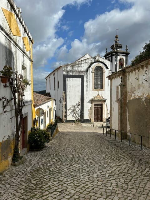 From Fátima: Batalha, Nazaré, and Óbidos Full-Day Tour - Nazaré: Coastal Views and Legendary Waves