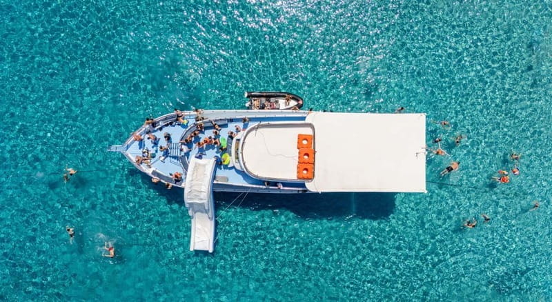 FROM LATCHI: Blue Lagoon Akamas Cruise - large water slide - The Blue Lagoon Experience: Swimming, Snorkeling, and Water Fun