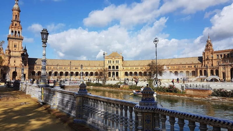 From Malaga: Seville Day Trip with Real Alcázar Tickets - Santa Cruz: The Heart of Old Seville