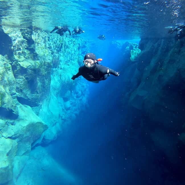 From Reykjavik: Silfra Snorkeling with Free Photos - Entering the Blue: What to Expect in Silfra
