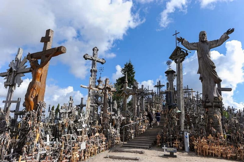 From Riga: Hill of Crosses & Enchanting Jelgava Group Tour - Crossing Borders and the Scenic Drive