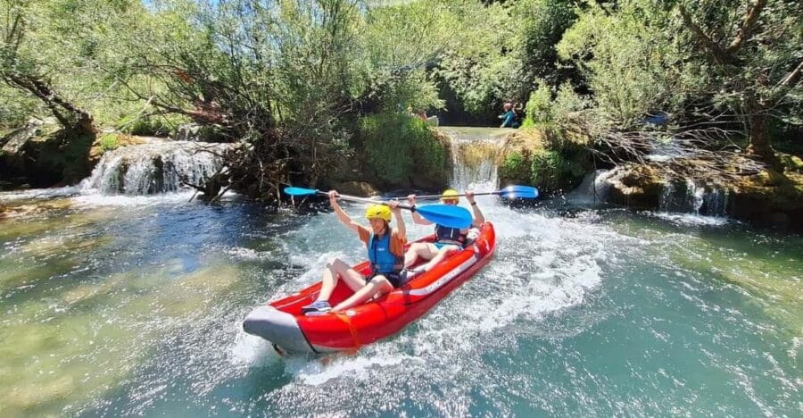 From Slunj: Mreznica Kayaking Adventure - The Thrilling Cliff Jump and Waterfall Climbing