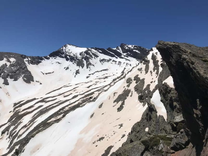 Granada: High Sierra Nevada Hiking Tour to 3000 Meters - Exploring San Juan Valley: Glacier Valleys and Waterfalls