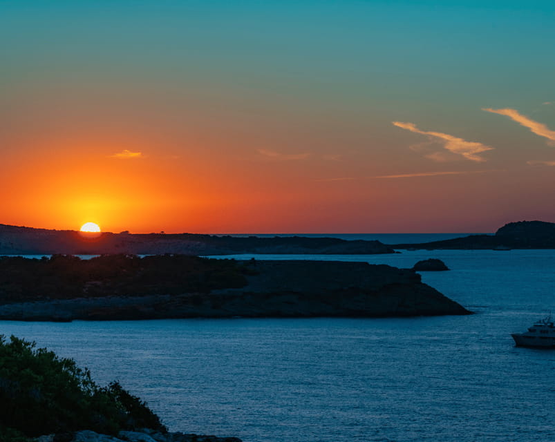 Ibiza: Sunset Boat Tour with Water Sports, Open Bar & Tapas - Exploring Ibiza’s Scenic Coastline and Hidden Coves