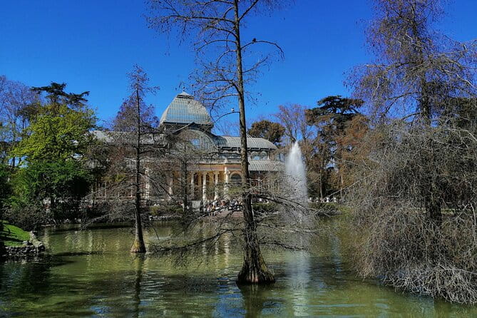 Madrid Bike Tour with Churros and Wine, Ham, and Cheese Upgrade - End with sweet and savory delights
