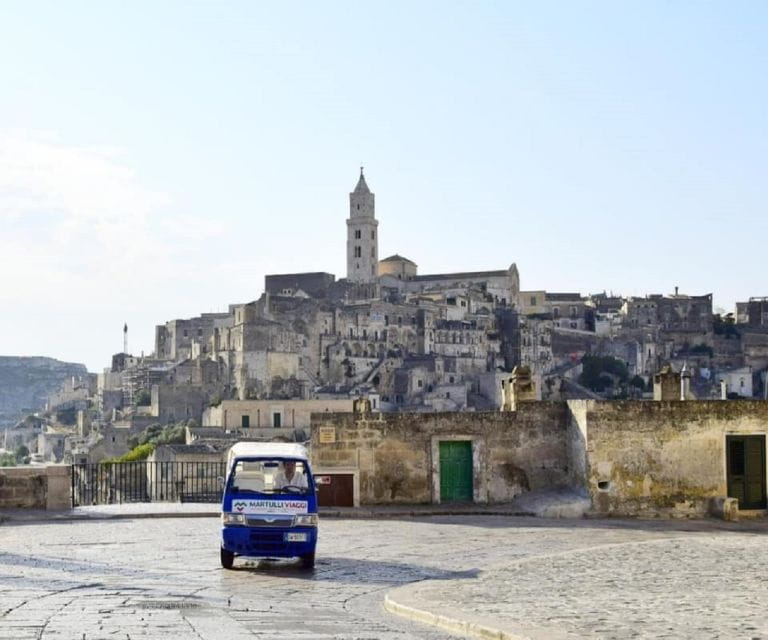Matera: Panoramic Tuk-Tuk Tour - Visiting Iconic Sites: The Purgatory Church and Piazza Duomo