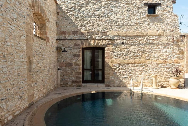 Nature and relaxation by the pool at Baglio Passofondo Estates - Price and Value