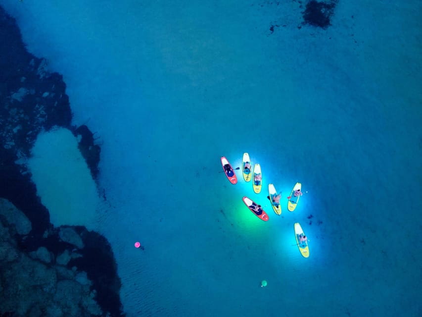 Paddle Surf with Led lights at sunset in Menorca - Why It’s a Good Value for the Experience