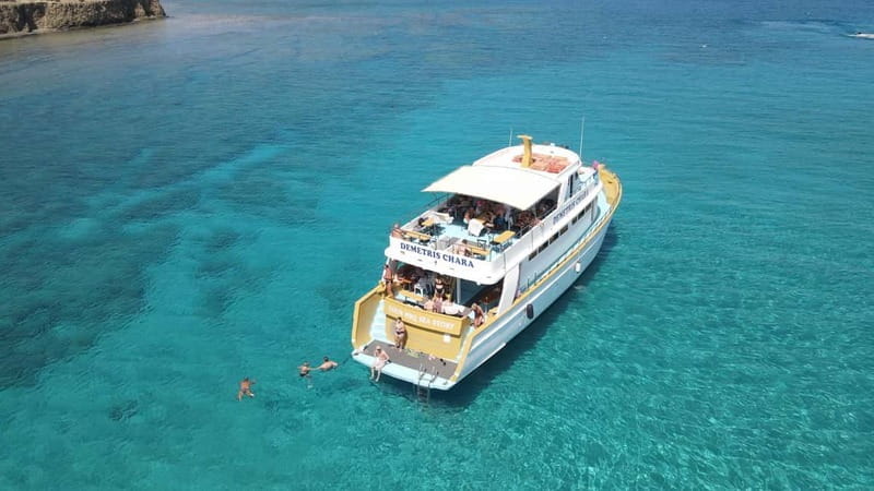 Polis: Blue Lagoon Boat Tour with Optional Barbecue Lunch - Scenic Highlights: Blue Lagoon and Sea Caves