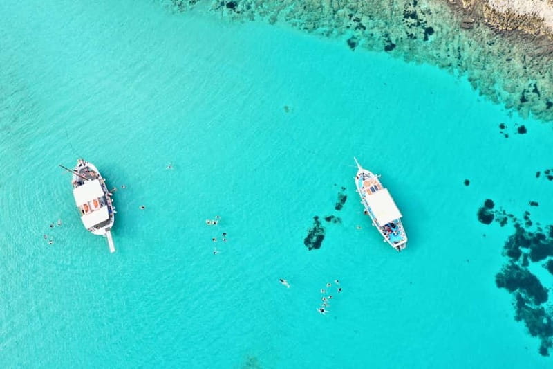 Pounta: Blue Lagoon Boat Tour - Navigating the Waters to San Nikolas Island