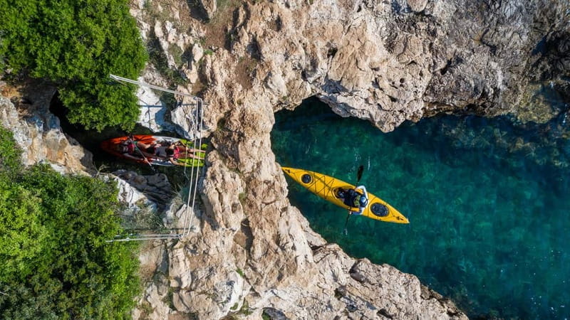 Pula: Islands, cliffs, cave, canyon, kayak tour, snorkeling - Entering the Canyon: A Heightened Experience