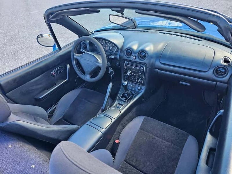 Rethymno: Ride with a Mazda MX5 cabrio 1991 for 12 hours - Price and Logistics