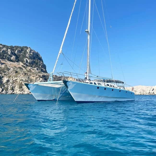 Rhodes: Catamaran Cruise with Snacks, Wine & Sunset Viewing - Discovering Kallithea Springs Beach and Its Charm