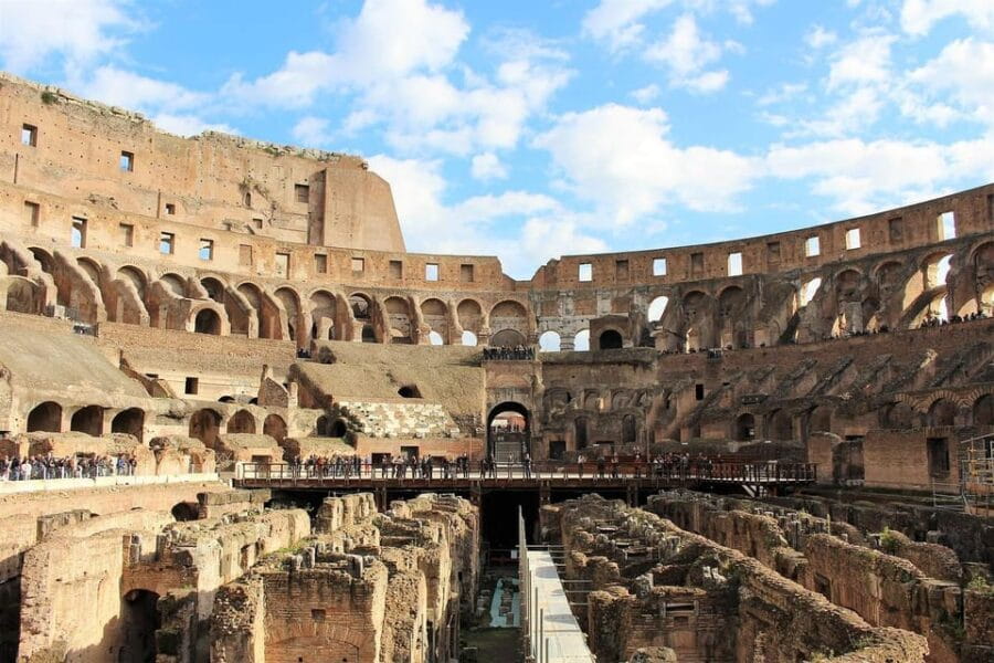 Rome: Colosseum, Forum, & Palatine Hill with Audio Guide - Walking the Roman Forum: Ruins and Stories