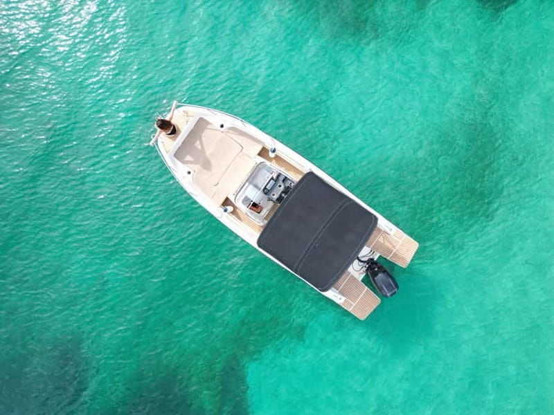 San Antonio: Private Boat Tour in Ibiza with Paddle Surf and Snorkeling - Exploring Ibiza by Boat: An Authentic Escape