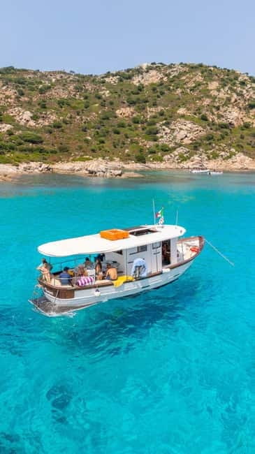 San Teodoro: Fishing trip and lunch with fresh catch and diving among the islands - Snorkeling in the Molara Pools: A Colorful Underwater World