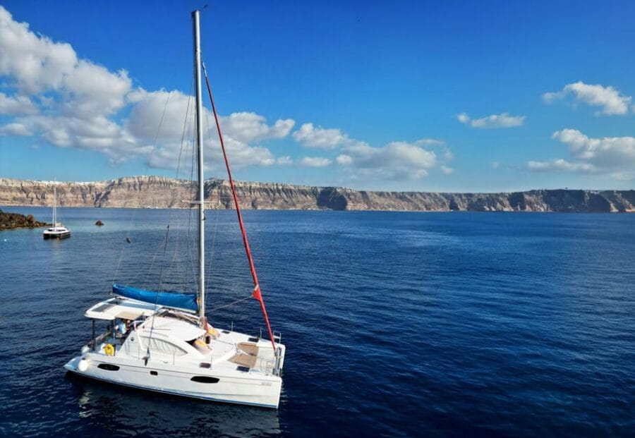 Santorini: Catamaran Cruise with Greek BBQ and Drinks - Visiting Akrotiri and Its Iconic Landmarks