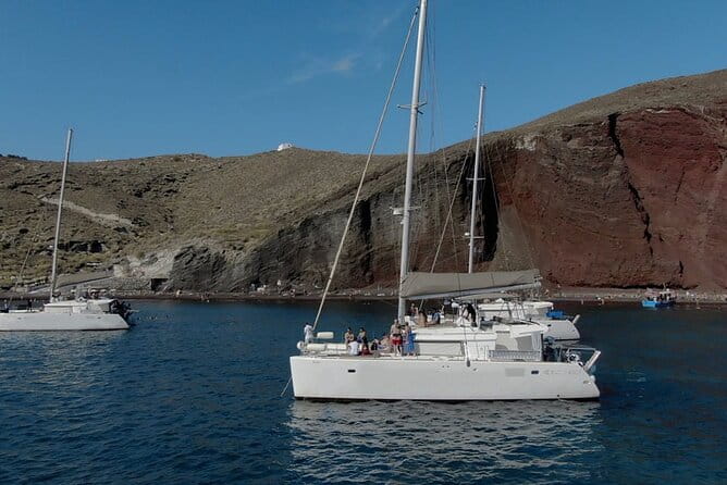 Santorini Cruise Port: 4-Hour Private Luxury Caramaran Cruise - Overflying Oia and Thirassia Island