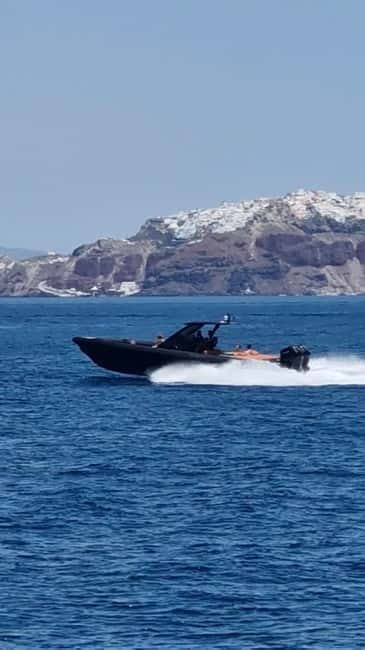 Santorini: Private Exhilirating Cruise to Ios & Mykonos - Exploring Mykonos: The Cosmopolitan Charm