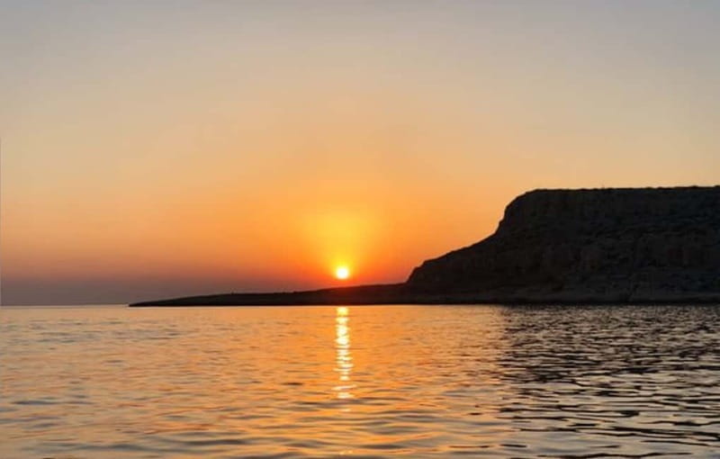 Sunset trip with swim stop at blue lagoon and turtles bay. - Setting Sail from Protaras: A Relaxed Coastal Evening