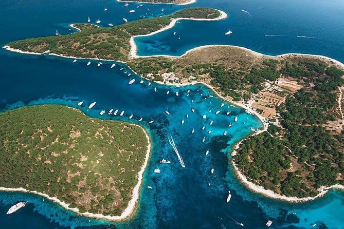 Trogir,Blue Lagoon and olta island full day Private Boat Tour - Blue Lagoon: Crystal Clear Waters and Sun-soaked Relaxation