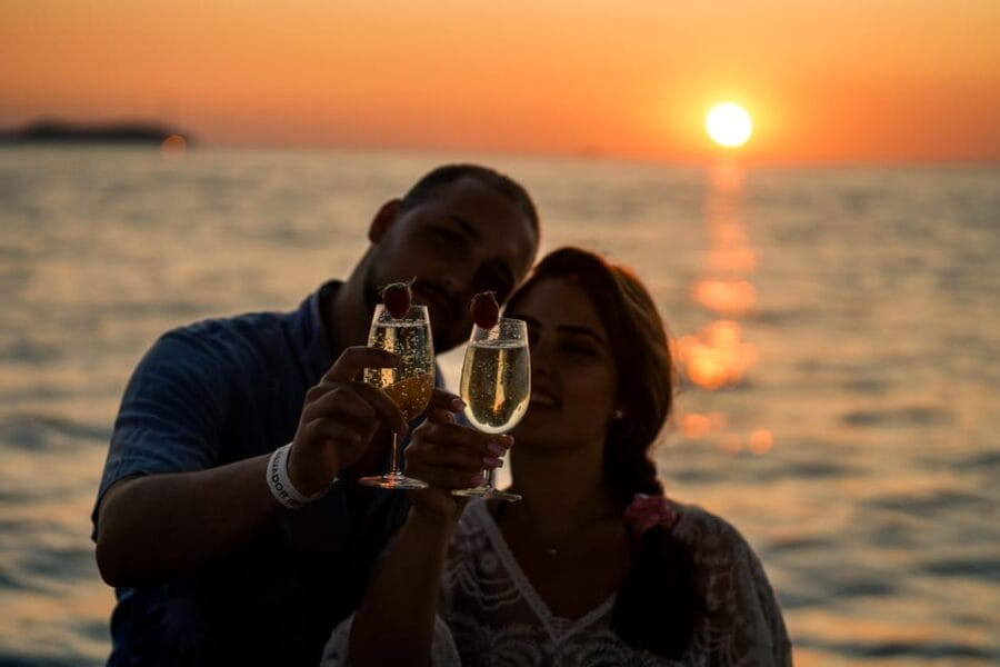 Ibiza: Secret Coves Guided Boat Tour with Open Bar and Tapas - Setting Sail from San Antonio: The Itinerary