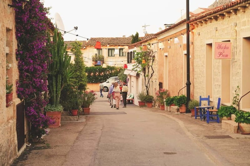San Pantaleo: Walking Tour with Aperitif - Who Should Consider This Experience?