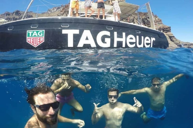 Santorini: Adventurous Catamaran Experience with Snorkeling - What Makes This Tour Stand Out